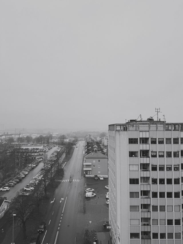 a photograph of a black and white photo of a city street